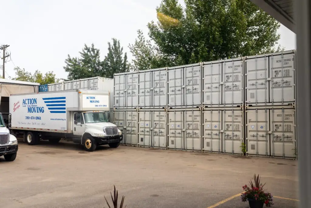 Action moving truck in front of storage units
