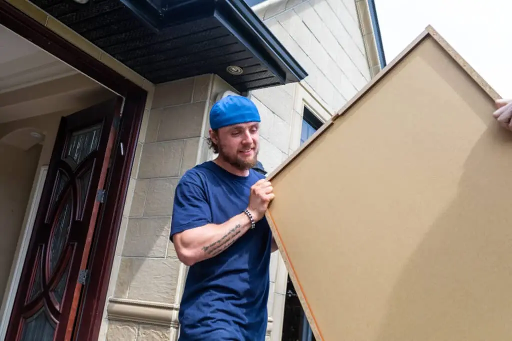 Man moving a box